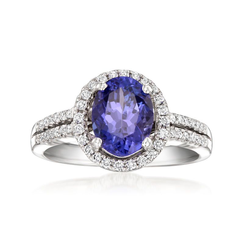 Tanzanite and diamond halo ring, oval blue center stone in 18kt white gold