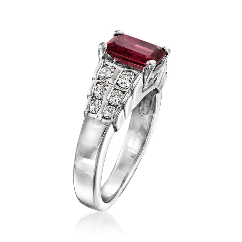 Platinum ring with emerald-cut red rhodolite garnet and diamond accents