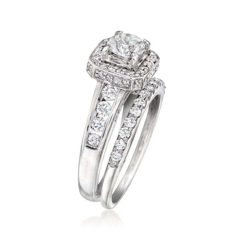 14kt white gold diamond ring set with oval center stone and baguette accents