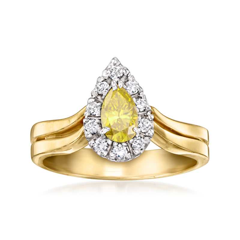 Vintage yellow diamond ring in 14kt yellow gold with halo of white diamonds