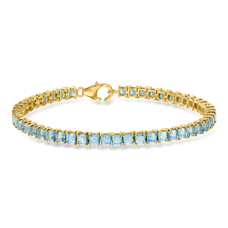 Sky blue topaz tennis bracelet, 18kt gold over sterling, hinged clasp, baguette stones