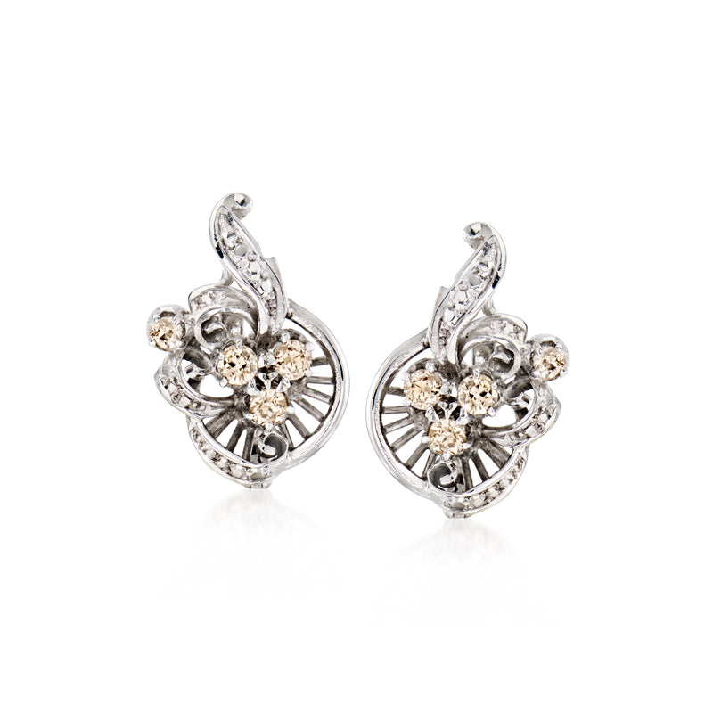 Swirl diamond stud earrings in 10kt white gold with brown and clear stones, post backs