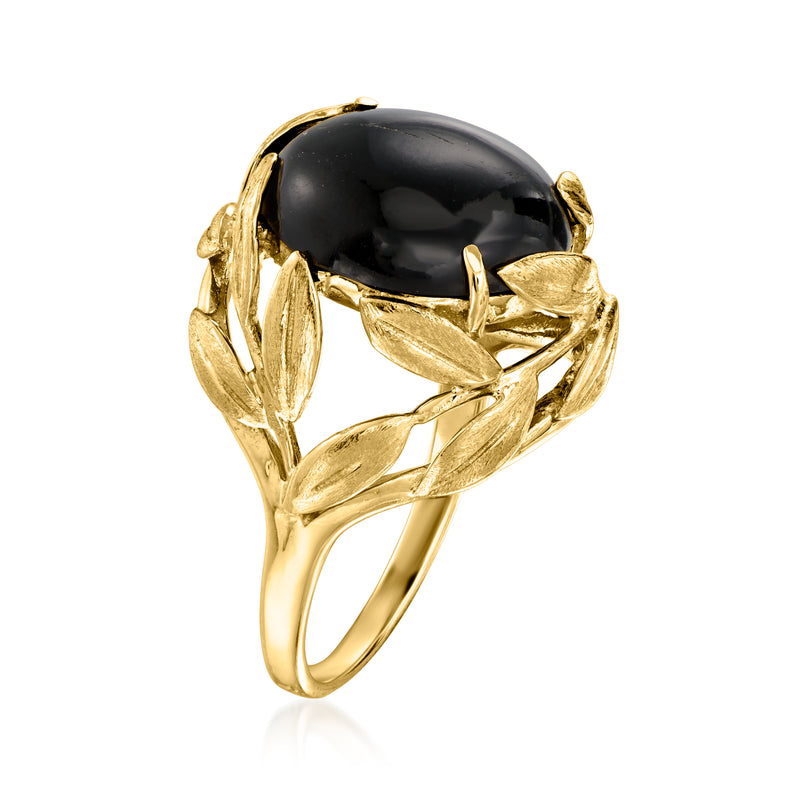 14kt yellow gold ring with oval black cabochon and swirling leaf band, side view