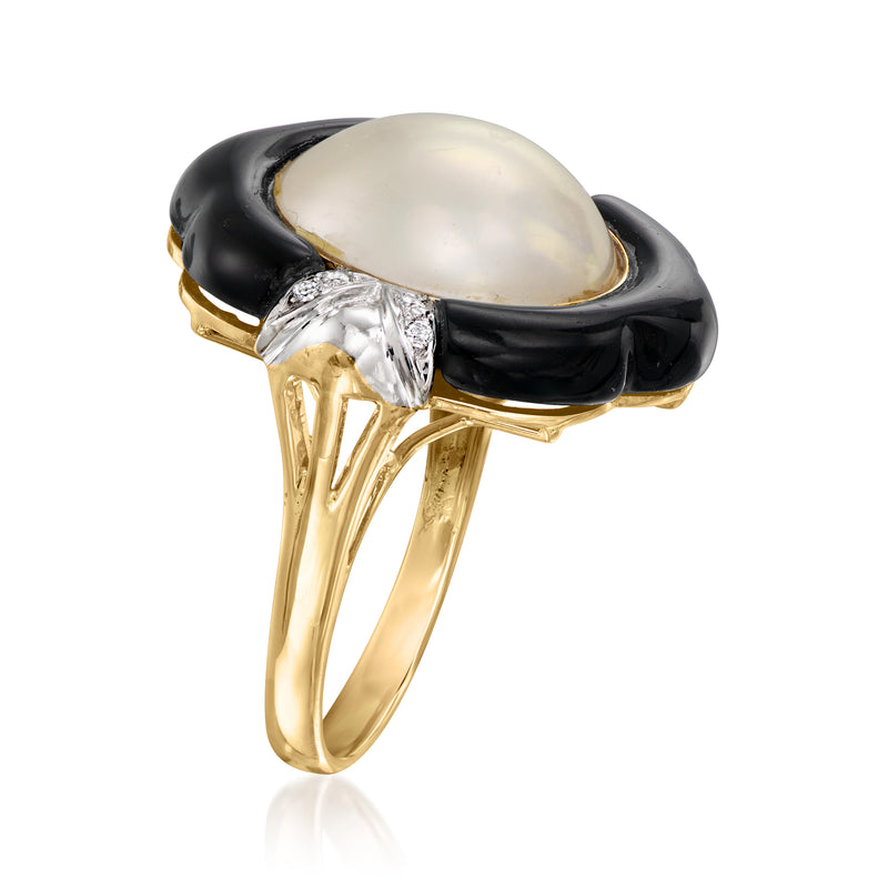 Black cabochon pearl ring with diamond sidestone clusters and yellow gold band