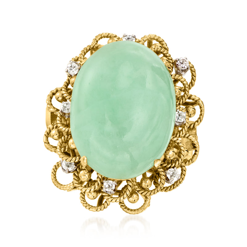14kt yellow gold cocktail ring with oval jade cabochon and diamond halo accents