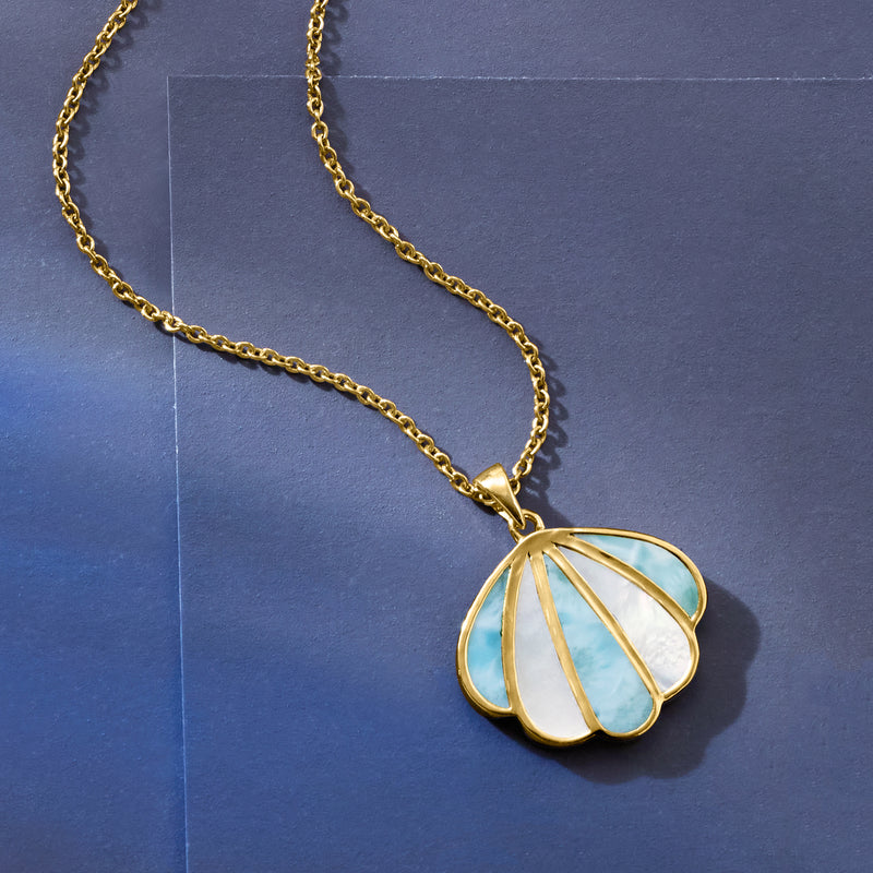 Gold seashell pendant necklace featuring mother-of-pearl with blue larimar detail