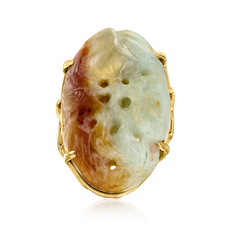 Carved jade cabochon ring in 14kt yellow gold, oval with openwork prongs