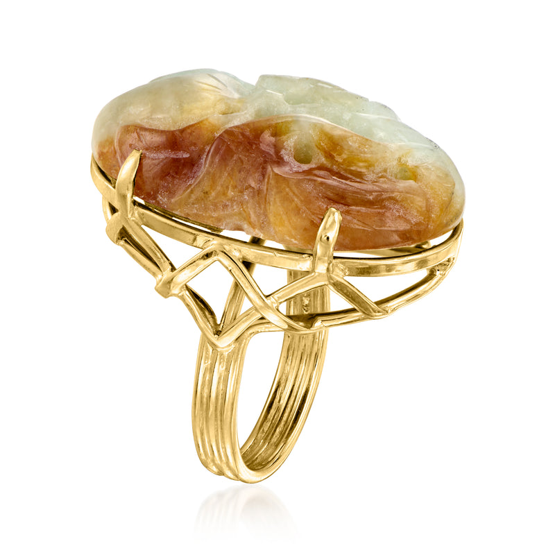 Oval carved jade cabochon ring with 14kt yellow gold openwork band and prongs