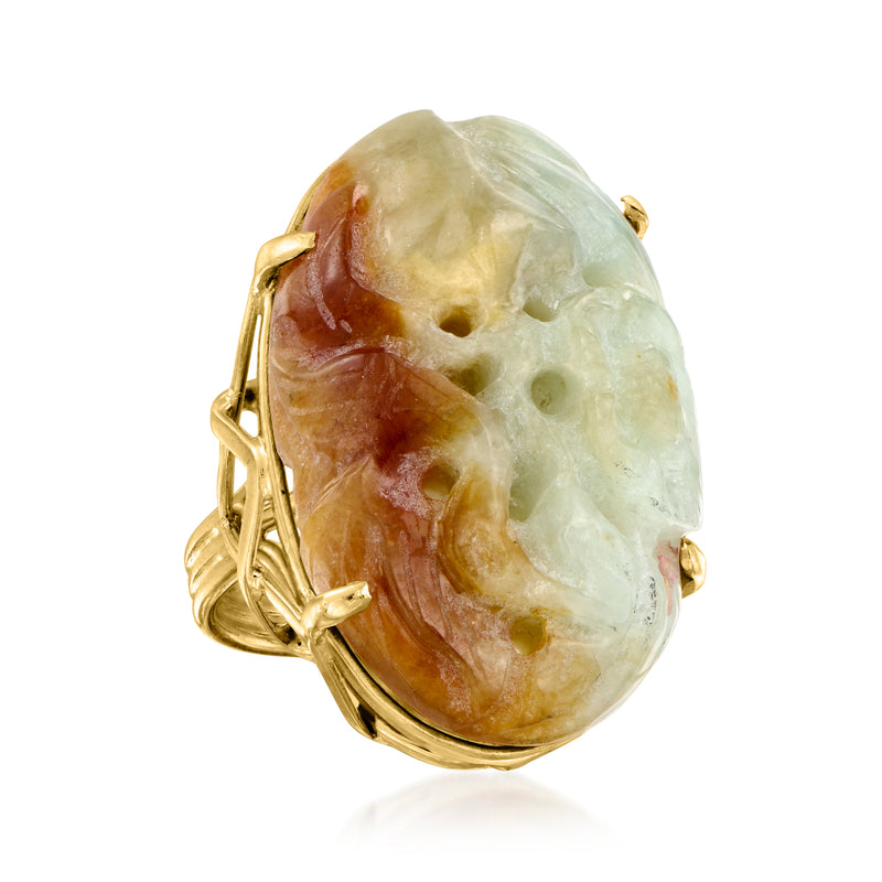 Carved oval jade cabochon ring in 14kt yellow gold bezel with prongs
