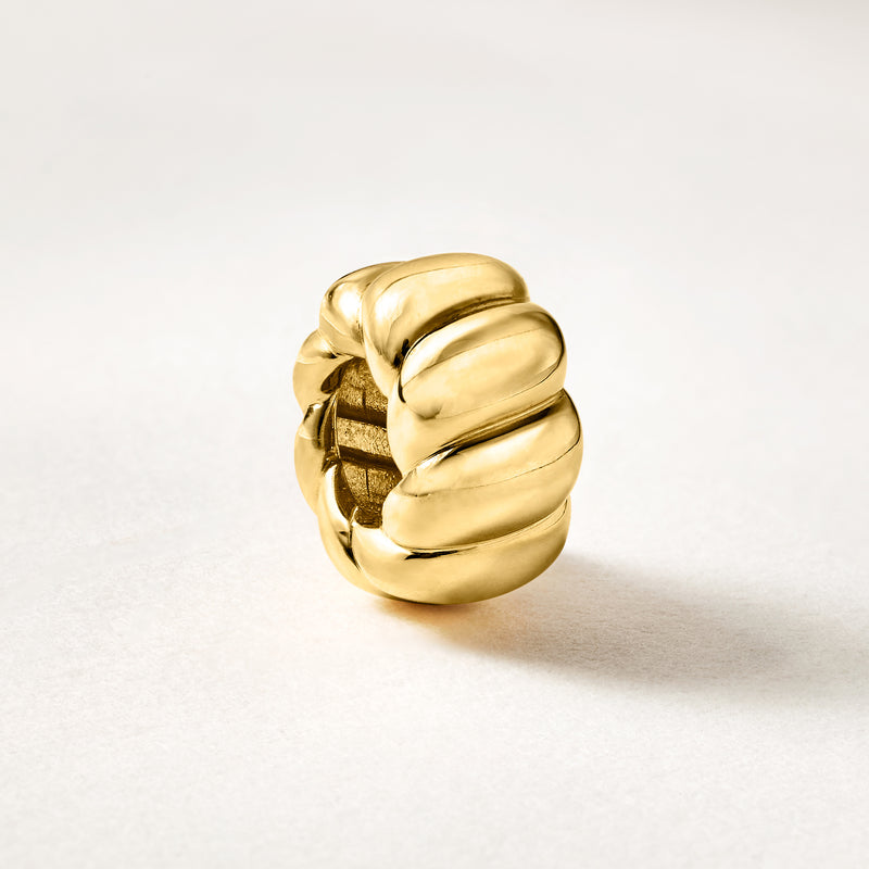 Gold ribbed bead charm in profile, ribbed tube with smooth shine