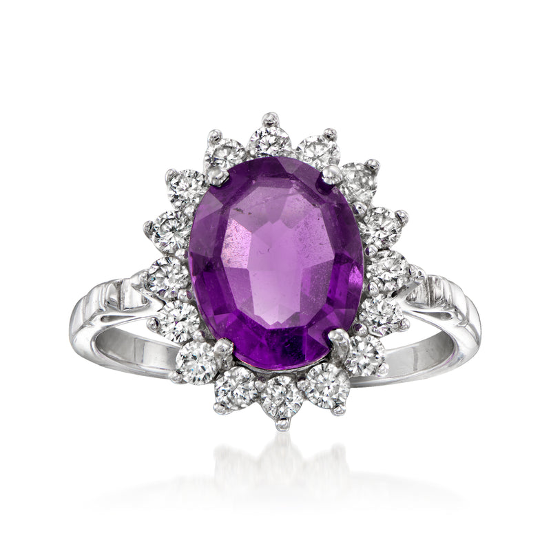 Amethyst halo ring in white gold with oval purple gemstone and diamond accents