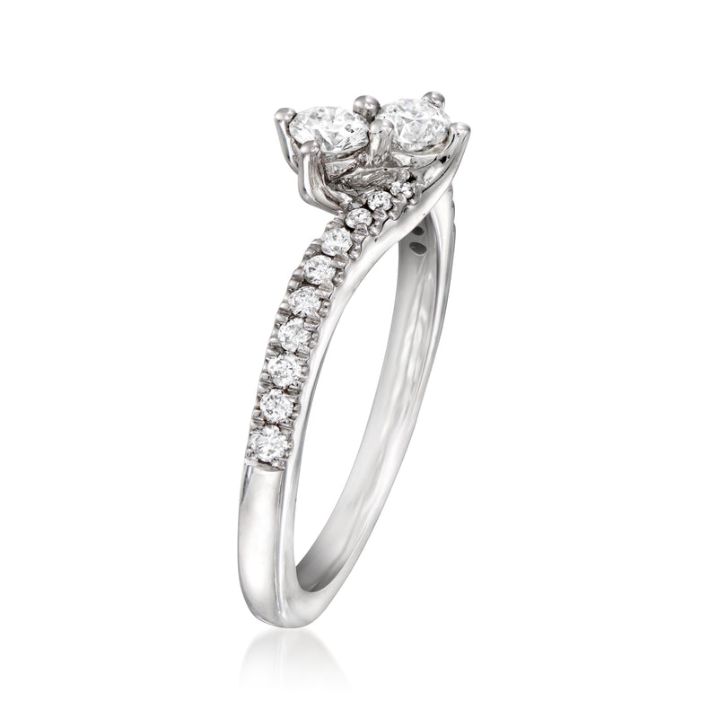 Vintage 14kt white gold bypass ring with diamond cluster and pavé band