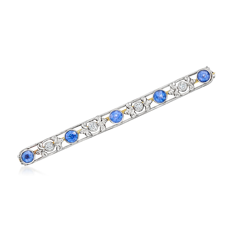 Vintage platinum bar pin with oval blue sapphires and small round diamond accents