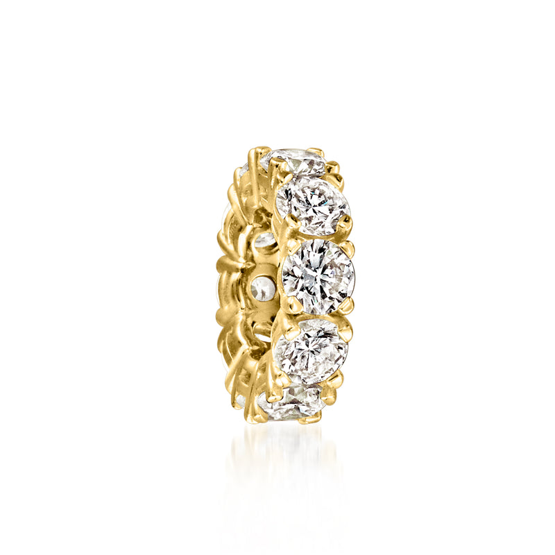 Gold over sterling diamond bead charm with three round stones and openwork side detail