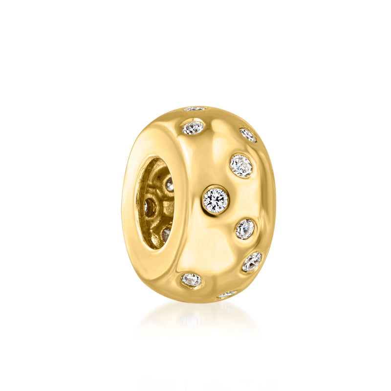 Gold diamond bead charm with scattered round stones on a polished oval bezel