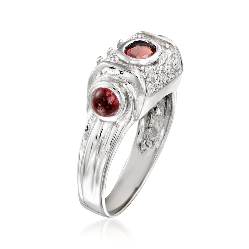Vintage white gold ring with oval red garnet center and round red side accents