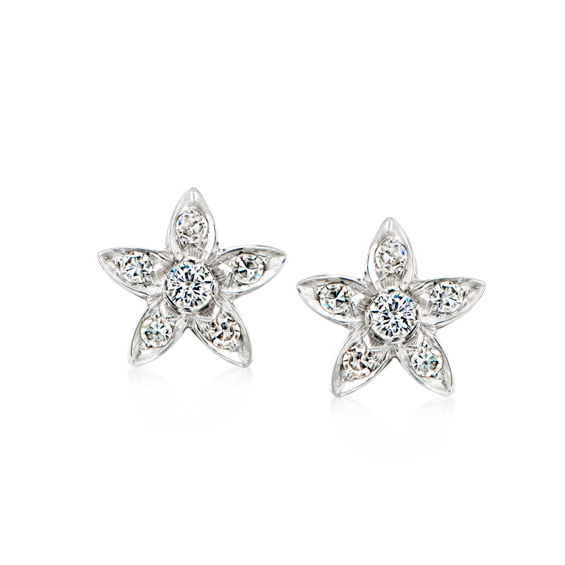 Platinum diamond flower post earrings, five-stone star design with round center