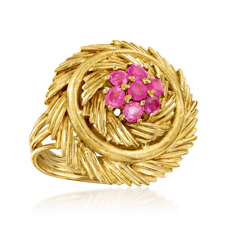 Vintage 18kt yellow gold ruby cluster ring featuring round pink stones in ornate swirl halo