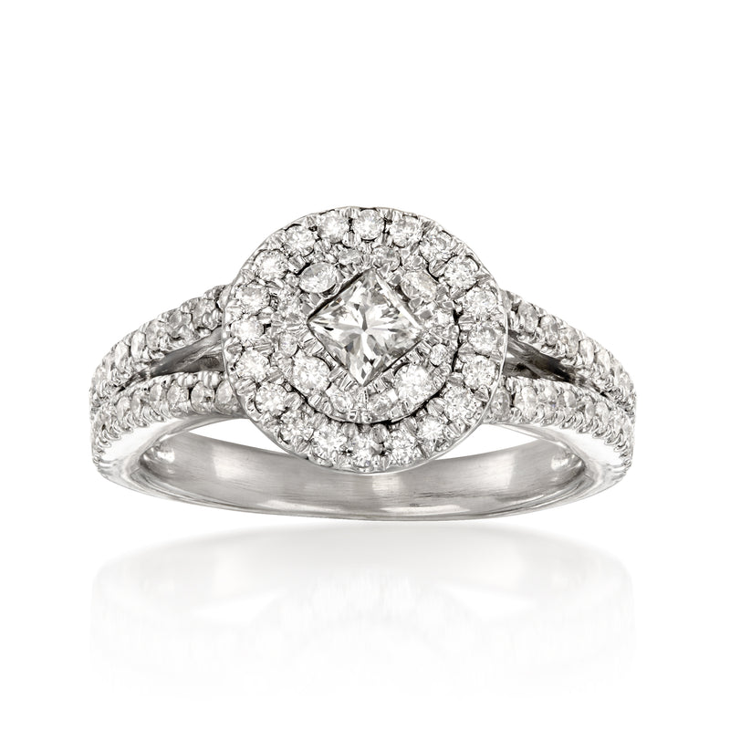 Diamond ring in white gold with halo setting and pavé band