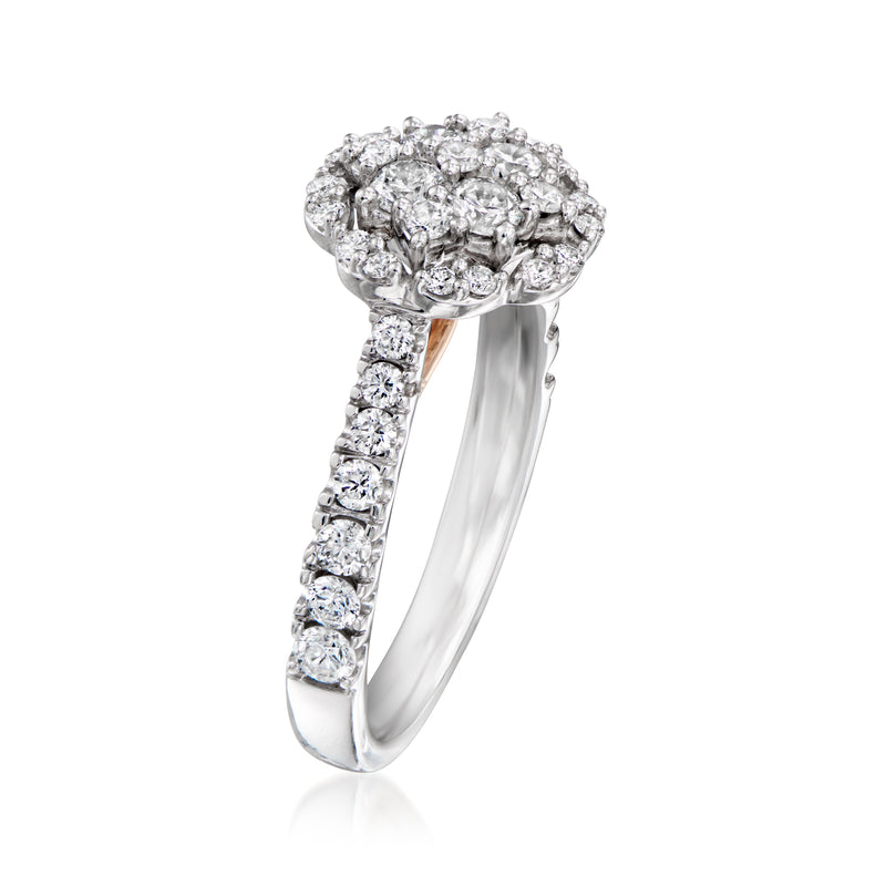 Diamond cluster ring in two-tone gold with pavé band and halo setting
