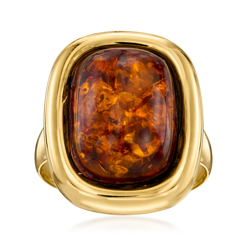 14kt yellow gold amber cabochon ring, oval bezel with openwork shoulders