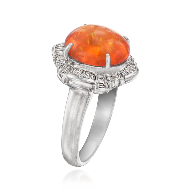 Orange opal cabochon ring in platinum with diamond halo and side baguettes
