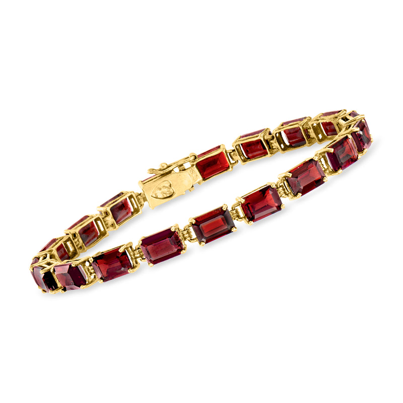 Vintage 14kt yellow gold garnet tennis bracelet with rectangular red stones, hinged clasp
