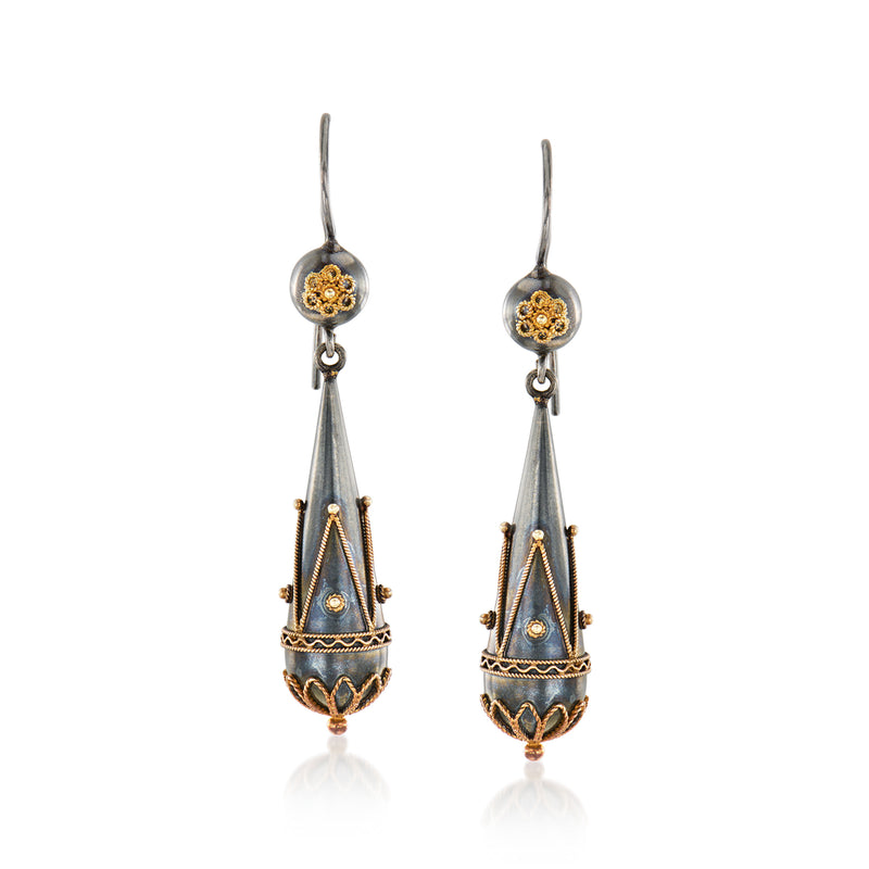 Sterling silver drop earrings with 18kt gold accents and teardrop charm dangles, earwire