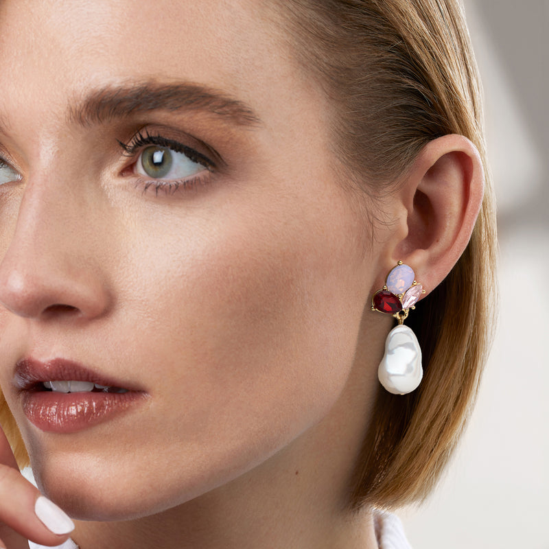 Gold-plated drop earrings with red/pink simulated gems and white pearl