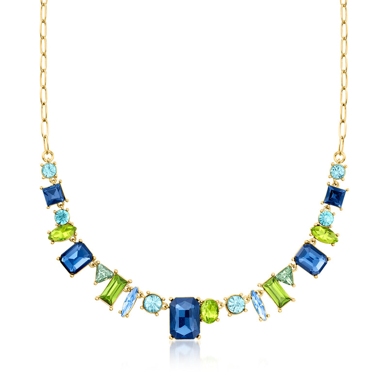 Gold-plated necklace with blue and green tonal square gemstones in a geometric design