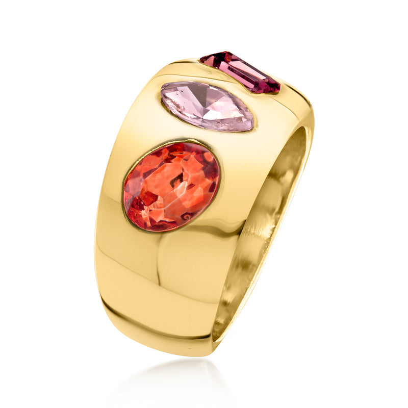 Gold-tone wide ring with oval pink and red simulated gemstones, side angle