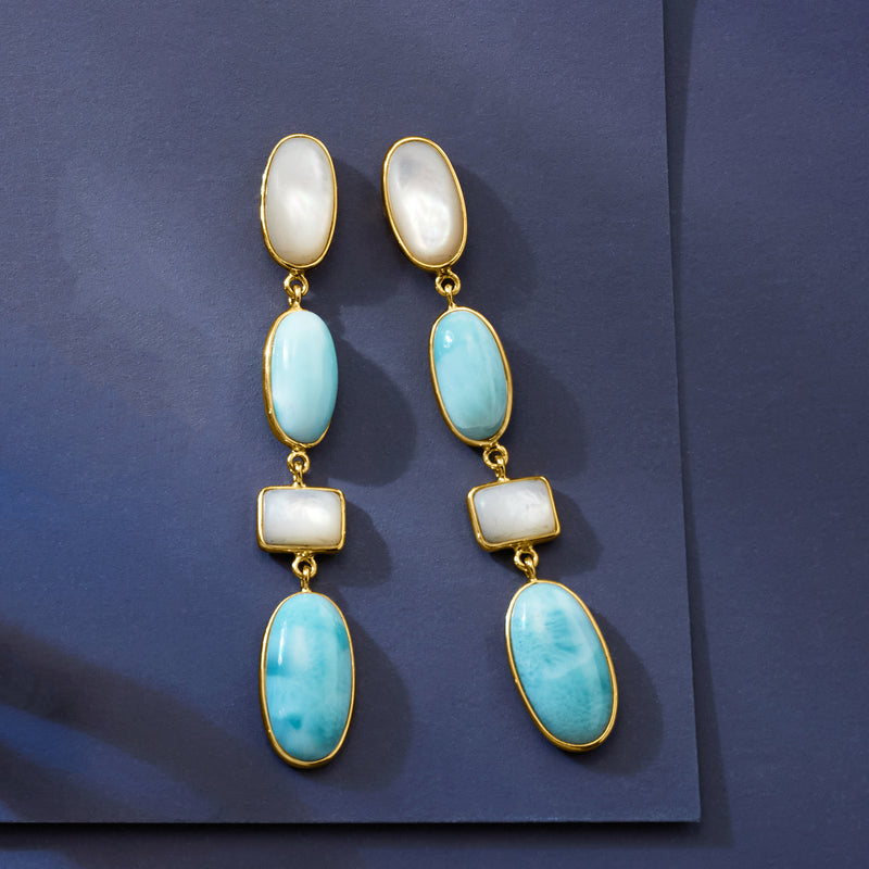 Gold drop earrings with alternating white and blue oval stones