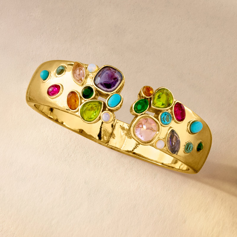 Gold-plated cuff bracelet with multicolored simulated gemstones, side view