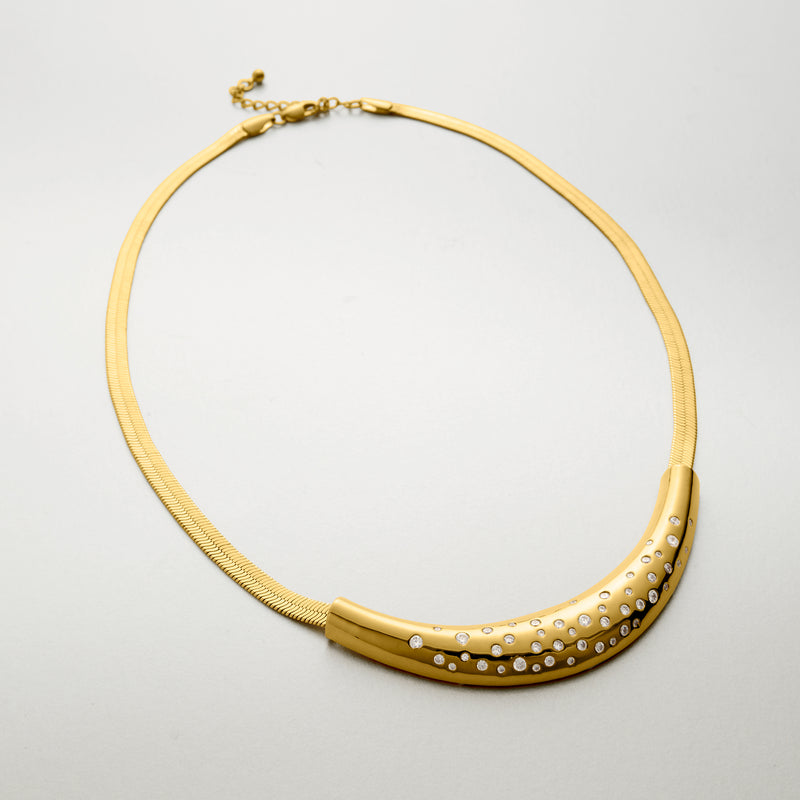 14kt yellow gold-plated herringbone necklace with CZ-studded curved pendant