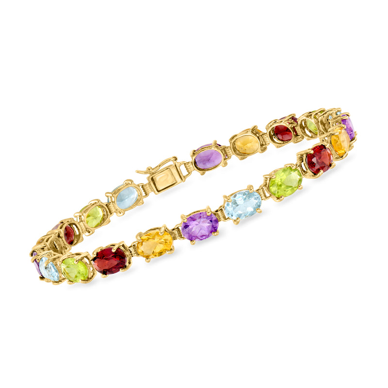 14kt yellow gold multi-gemstone bracelet with purple, red, green, and blue stones