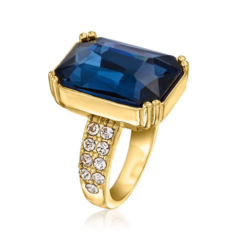 Gold-plated ring with large rectangular blue center stone and round CZ shank clusters