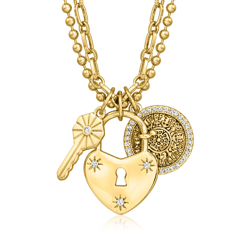 Gold-plated charm necklace with key, heart lock, and round coin accents with CZ shine