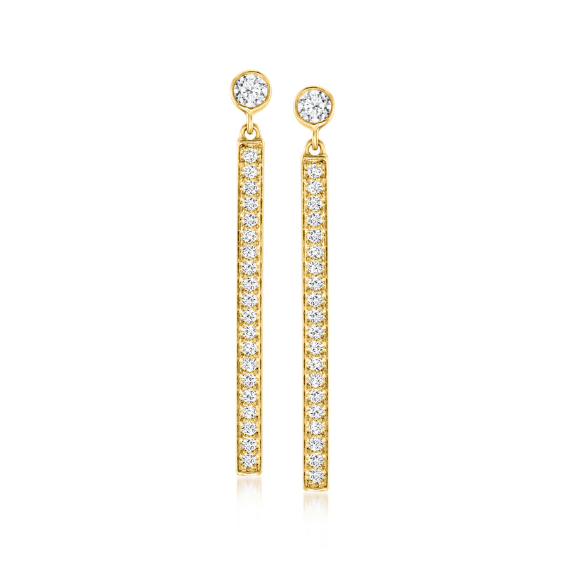 Gold drop earrings with vertical row of round stones and round top accent
