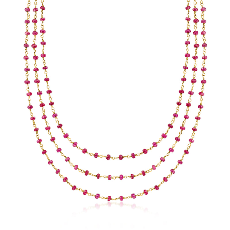 Three-strand ruby bead necklace with 9kt yellow gold links