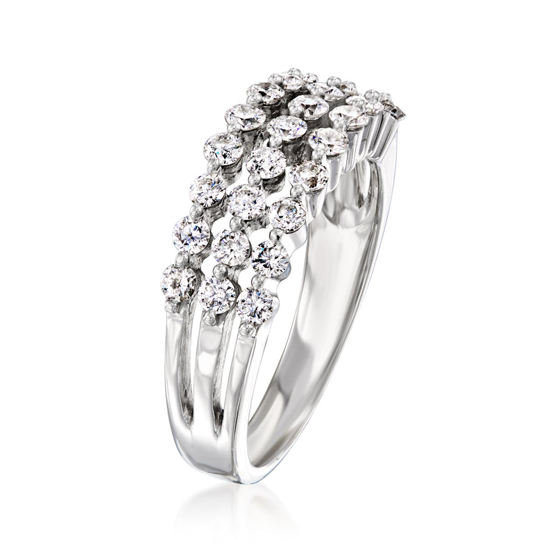 Three-row diamond band ring in 14kt white gold with oval-cut stones, angled view