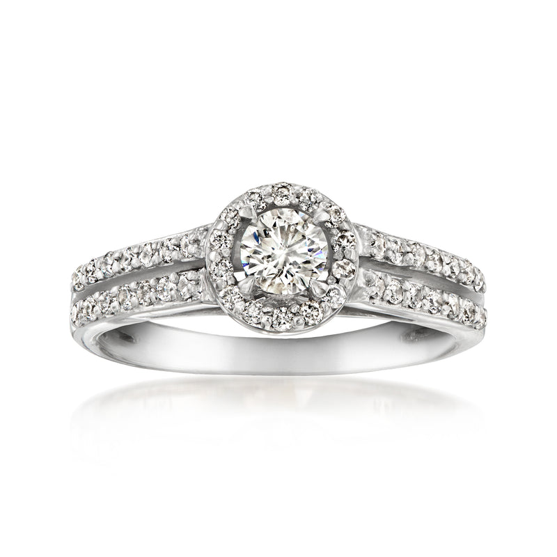 Vintage diamond ring in white gold with halo and split shank