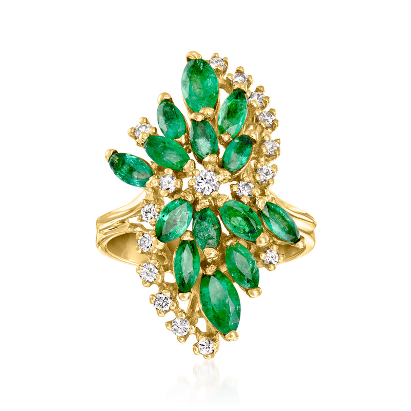 Vintage emerald and diamond cluster ring, oval green stones with yellow gold band.