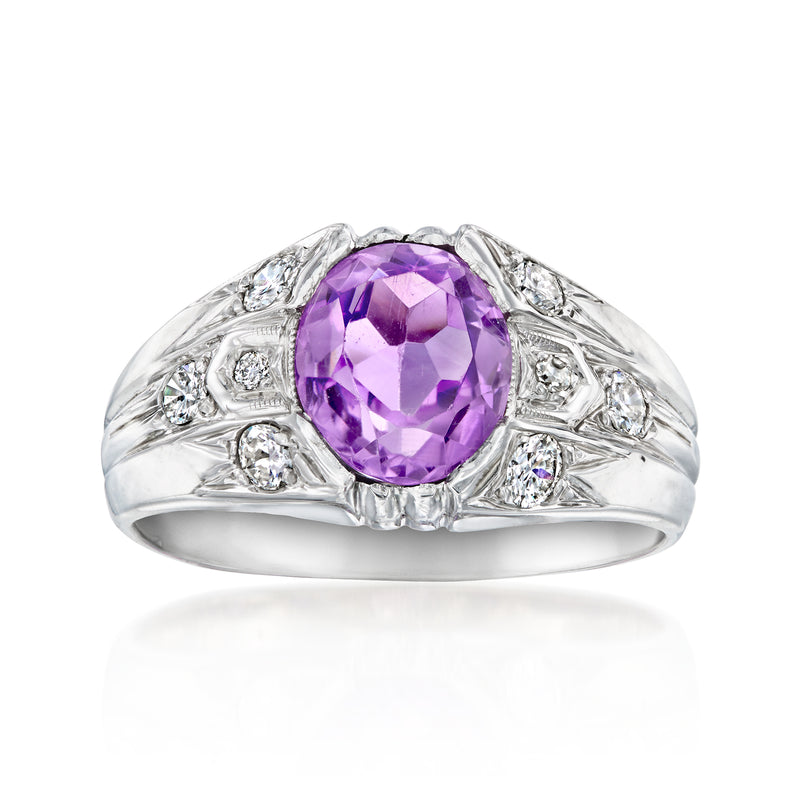 Amethyst and diamond ring in white gold, oval purple center with side stone accents