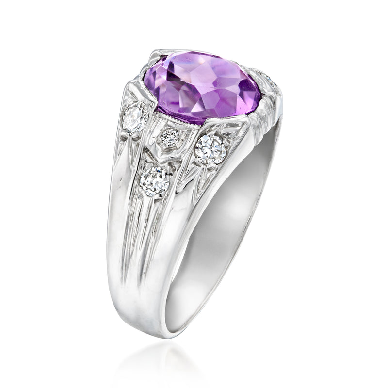 White gold ring with oval purple amethyst center and diamond accents, angled prong setting