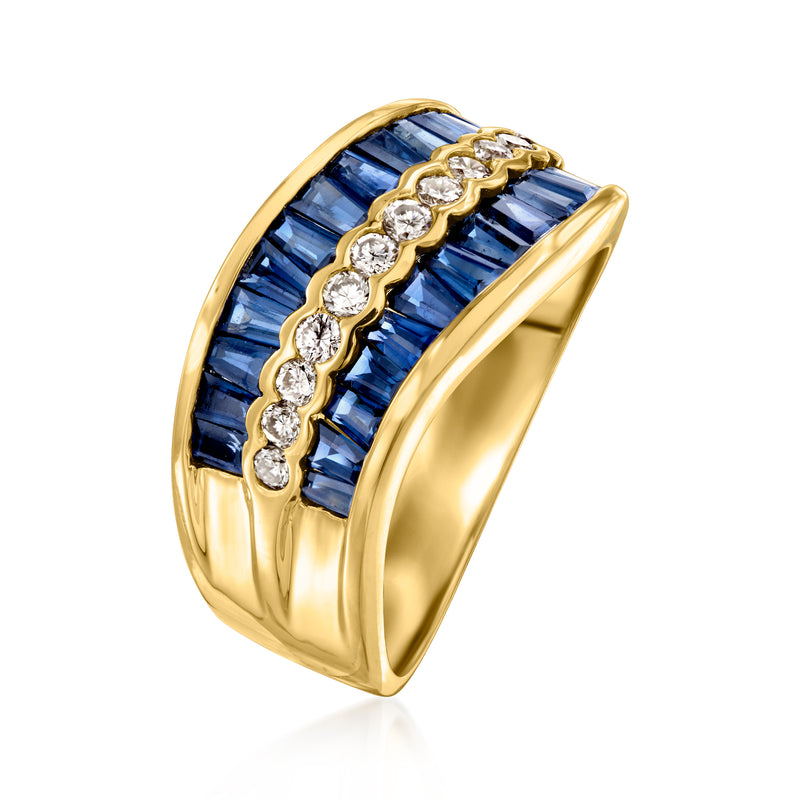 Yellow gold wave ring angled view with blue baguette sapphires and round diamonds