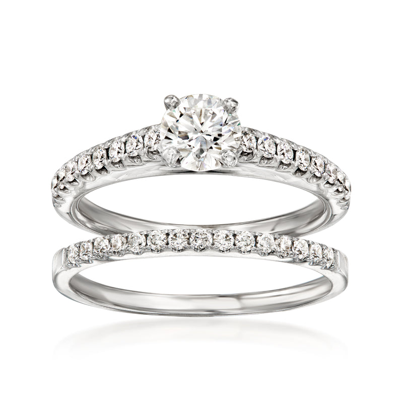 14kt white gold diamond bridal set with round center stone and pavé bands