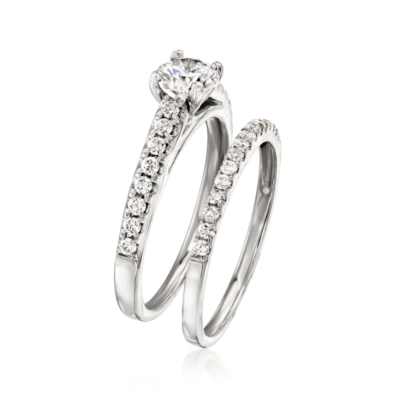 Vintage diamond bridal set with engagement ring and matching band in white gold