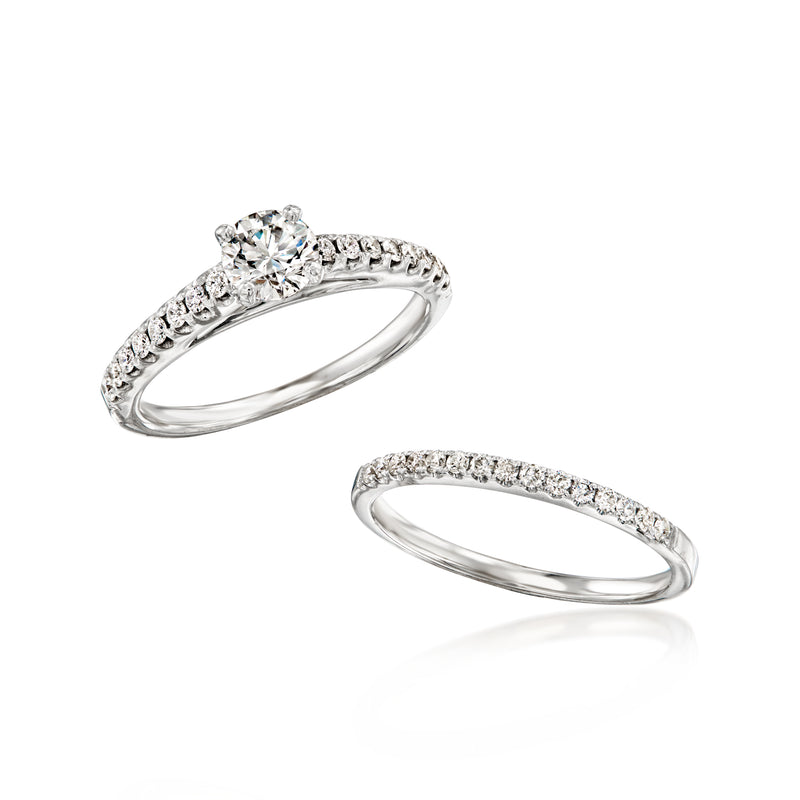 Diamond bridal set: solitaire engagement ring and pavé wedding band in white gold