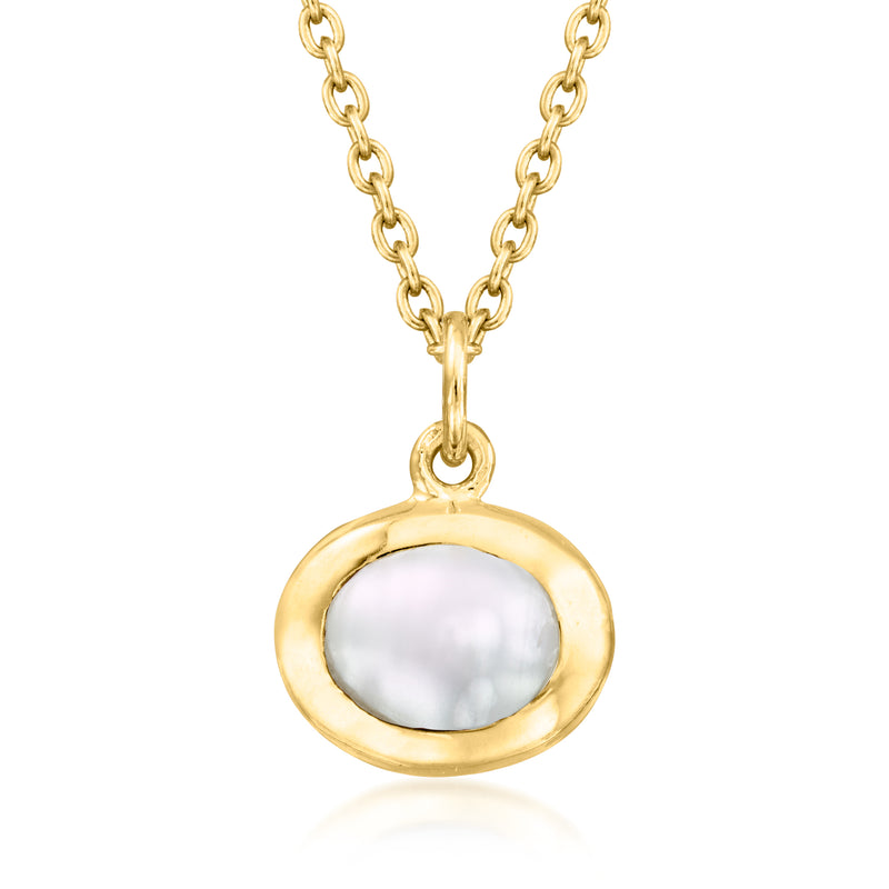 Gold-tone cable-chain necklace with white oval bezel pendant