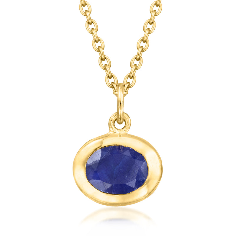 Gold-tone oval gemstone pendant necklace with blue bezel on cable chain